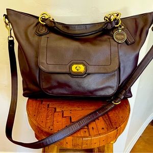 Large Coach tote bag with handles and removable shoulder strap.